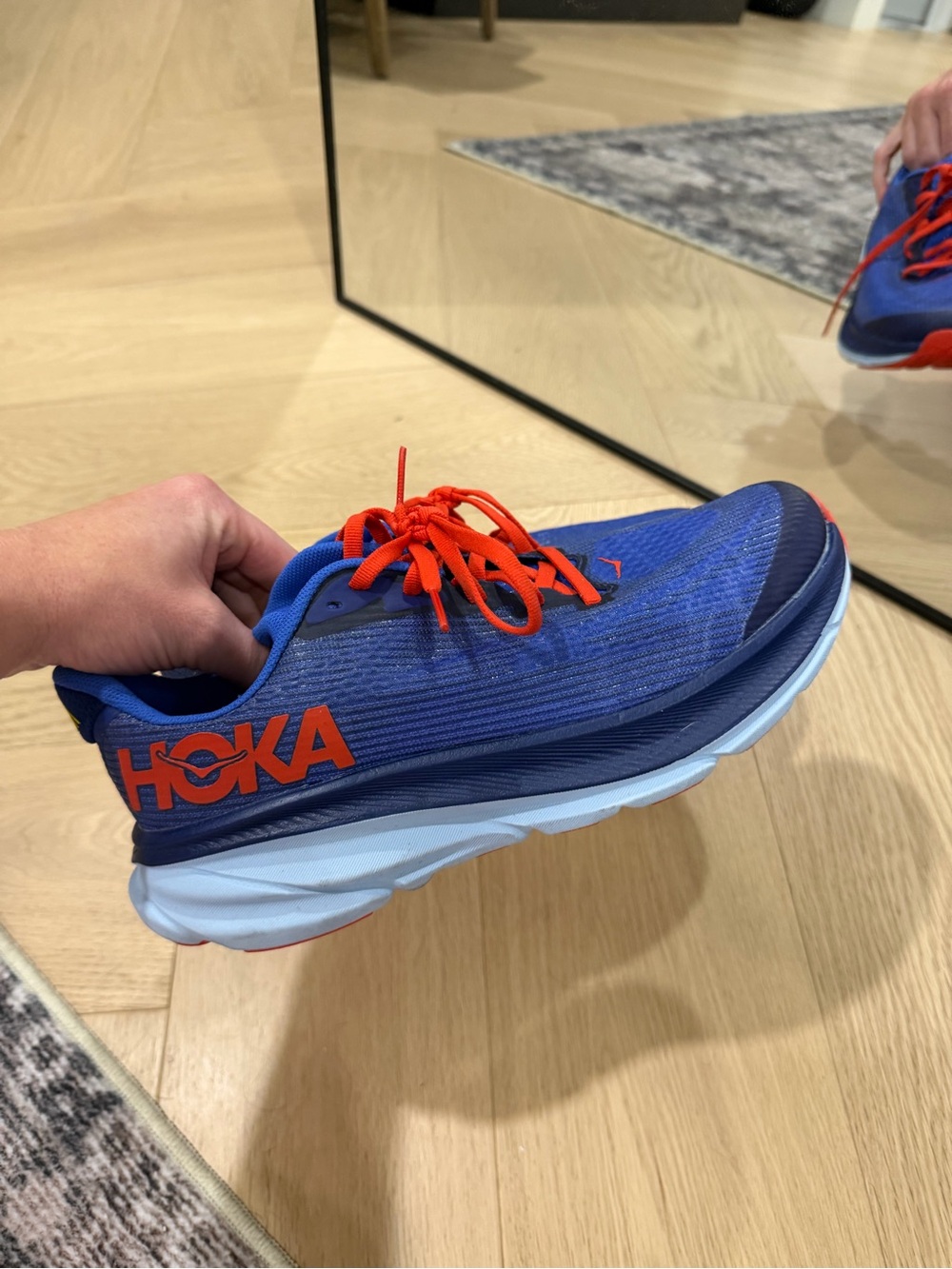 Hoka Royal Blue Sneakers with Bright Orange Accents